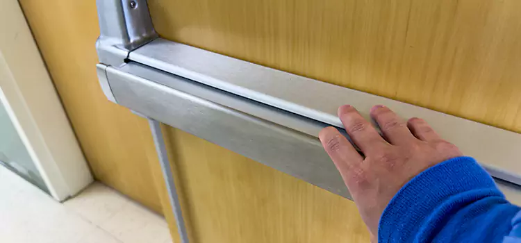 Installing a Push Bar on a Door Coral Gables